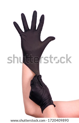 Hands in black medical gloves isolated on a white background