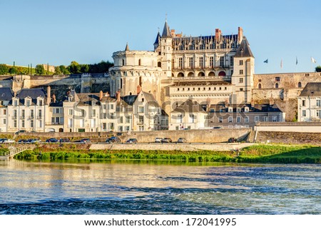 Castle d’Amboise in Loire Valley, France. Old French chateau is medieval landmark of Amboise city and its outskirts. Sunny panorama of Amboise at river, view of royal chateaux. World Heritage Site. Royalty-Free Stock Photo #172041995