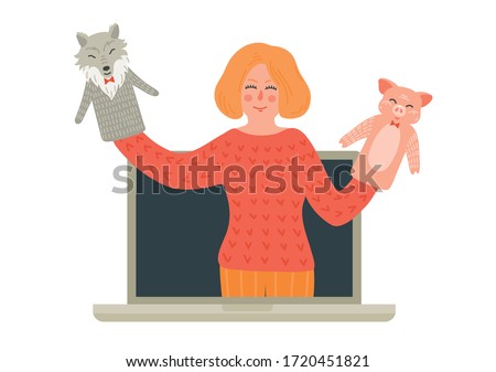 Online puppet theatre show. Woman on laptop screen tells  folk fairy-tale about wolf and pig. Distance children entertainment. Preschool education concept. Royalty-Free Stock Photo #1720451821
