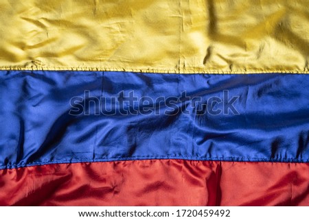 view of colombian flag yellow blue red shining cloth colombia