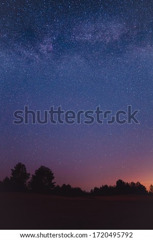 Landscape with blue Milky Way. Night sky with stars. Beautiful milky way taken in Ukraine during a clear night