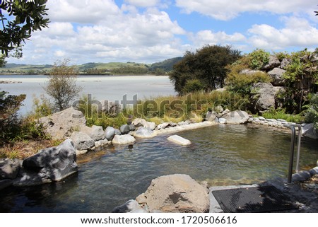 Hot pool in Polynesian Spa with view of the lake, Rotorua, North Island, New Zealand Royalty-Free Stock Photo #1720506616