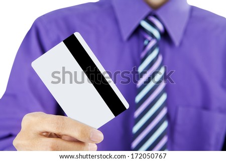 Close up of businessman holding a credit card