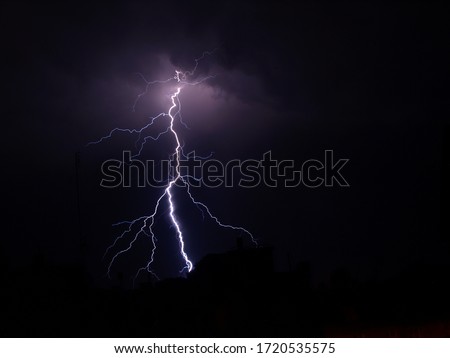 A storm in the purple sky