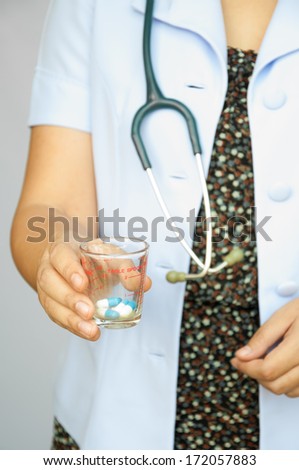 Doctor giving you a pill