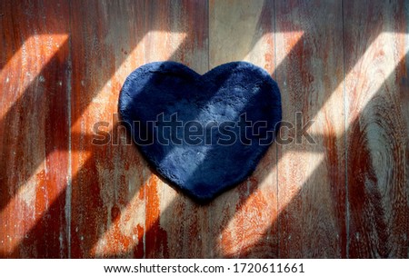   Bule rug,cloth doormat on wooden ground with sunshine and shadows                             
