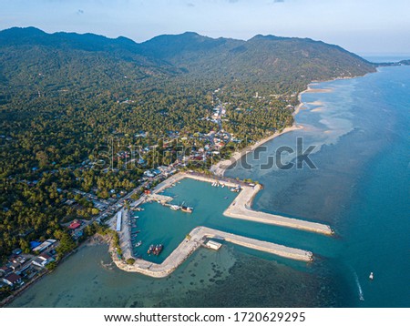 Aerial view of Baan Tai pier or Huatean Pier at Phangan island with clear blue sky, Thailand
