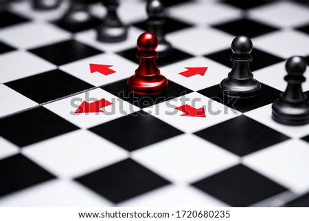 Red pawn chess stepped out of line to show different thinking ideas and leadership. Business technology change and disruption for new normal concept.
