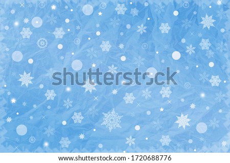 Christmas background in blue with white snowflakes