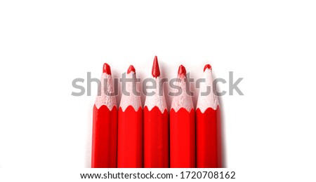 One sharpened pencil standing out from the blunt ones. It's easy to be beautiful if you do nothing concept. Red pencils on white.
