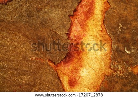 heavy rust copper and broken granite stone surface of cave for interior wallpaper and background