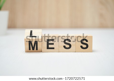 Less mess words on wooden blocks. Close up. Royalty-Free Stock Photo #1720722571