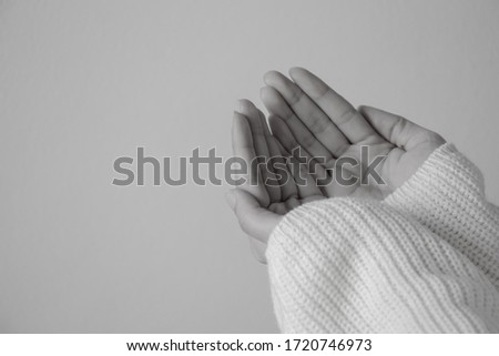 Black and white picture woman open hands, Praying hands with faith in religion and belief in god.