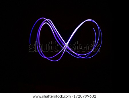  Infinity sign, drawing by light, photo.                 