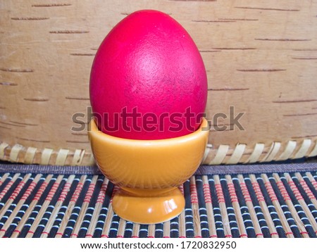 Red Easter egg. Colorful Easter eggs - part of the passover meal. Easter (Bright Sunday of Christ) is the oldest and most important Christian holiday. 
