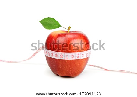red apple and measure tape isolated on white background                                    