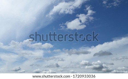Blue sky with white clouds. Clear sky in the afternoon.