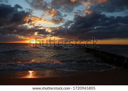 Panorama of the sunset on the beach in Ahrenshoop, Germany on the peninsula Fischland-Darss-Zingst on the Baltic Sea.