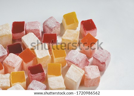 background with turkish delights on white ground