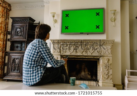 Boys sit at home TV and green screen ideas.