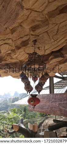 antique chandelier lamps are hanging on the ceiling