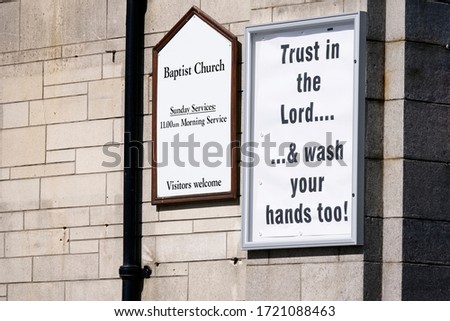 Wash hands message on religious church sign