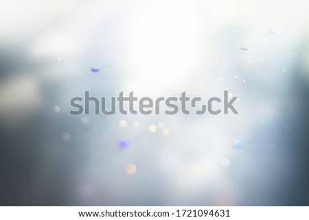 Abstract glitter christmas background with stars. Bokeh.