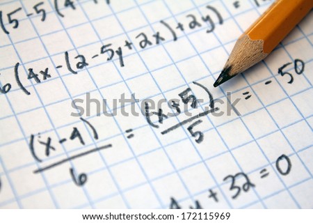 math problems on graph paper with pencil Royalty-Free Stock Photo #172115969