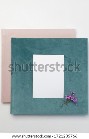 Photo albums with the cover pesenting the velvety touch of fabric