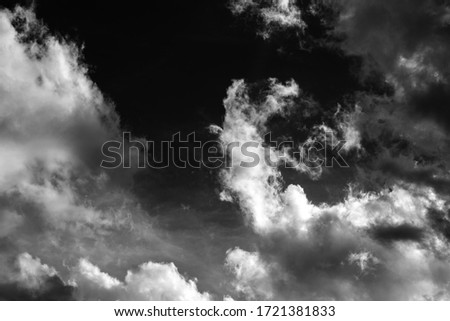 Nice blue sky with white clouds. Black and white photography.