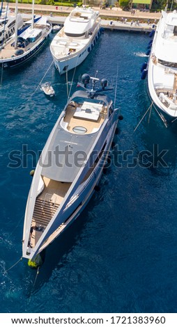 Aerial photo of luxury mega yacht on marina or sea