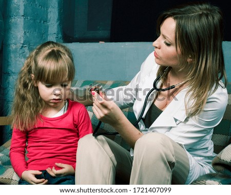young doctor with little girl patient feeling bad medical inspection with stethoscope, lifestyle pandemic people concept