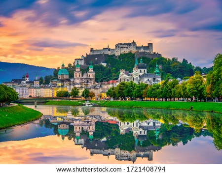Salzburg sunrise skyline with Festung Hohensalzburg fortress and reflection. Austria Royalty-Free Stock Photo #1721408794