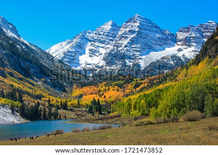 Aspen Colorful Autumun under Snow Mountain with Lake Royalty-Free Stock Photo #1721473852
