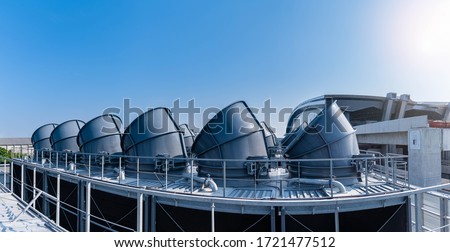 The industry cooling tower air conditioner is water cooling tower air chiller HVAC of large industrial building to control air system. Royalty-Free Stock Photo #1721477512