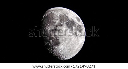 bright moon in black background 