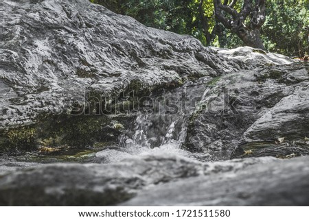 River stream and close up of rocks