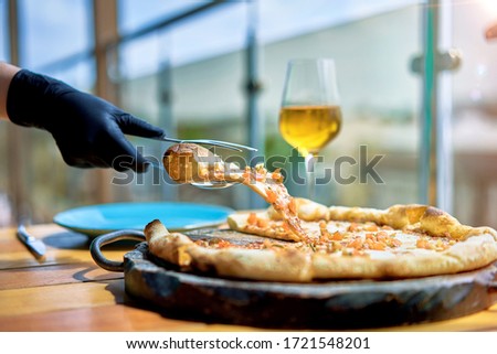 a slice of pizza is opened on the terrace