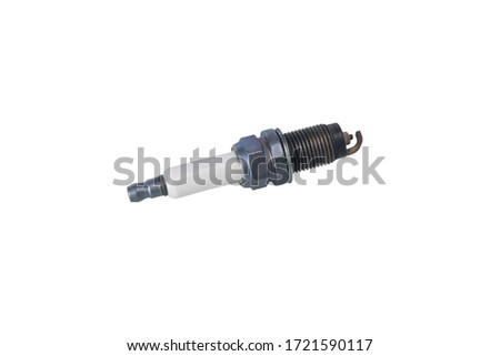 old spark plug for a car, on a white background