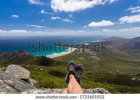 Hiker enjoying the view from the summit of Mount Oberon at Wilsons Promontory National Park at Victoria, Australia Royalty-Free Stock Photo #1721601922