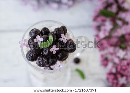 
Dessert. Blueberries. Blueberries. Lilacs. Photo for advertising
