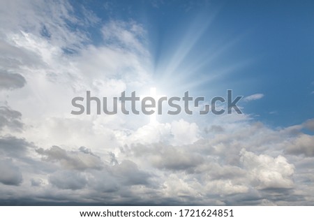 Religious background with Holy Cross glowing. Christian cross in a sky with some clouds. Cross Crucifixion Of Jesus Christ. Heaven and Hell