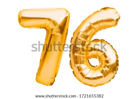 Number 76 seventy six made of golden inflatable balloons isolated on white. Helium balloons, gold foil numbers. Party decoration, anniversary sign for holidays, celebration, birthday, carnival