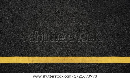 Surface grunge rough of asphalt, Seamless tarmac dark grey with yellow line on the road and small rock, Texture Background, Top view
