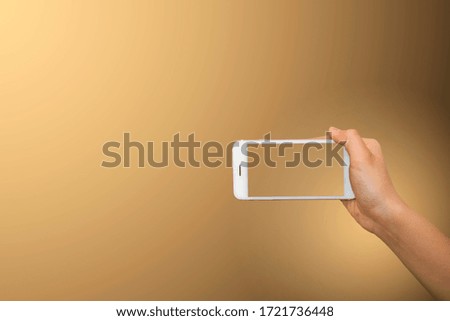 Hand woman holding smartphone with blank screen isolated on colorful background with clipping path