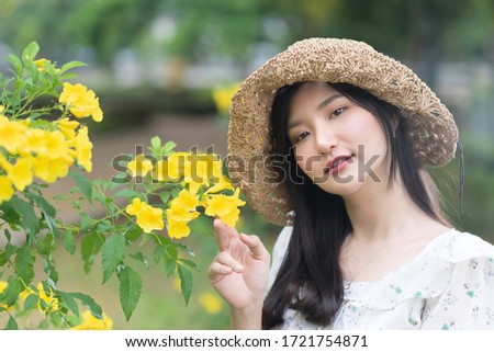Asian women happy smile on relaxing time.outdoor Portrait.