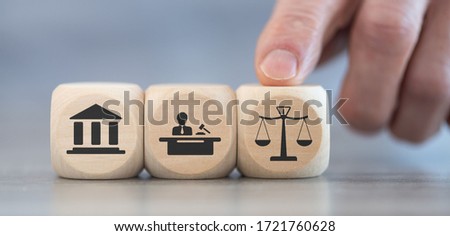 Concept of law and justice with icons on wooden cubes Royalty-Free Stock Photo #1721760628
