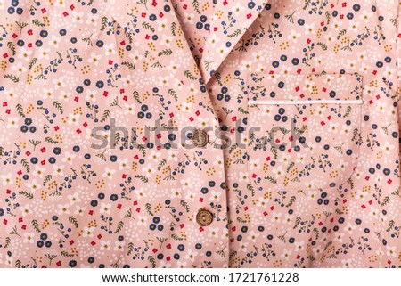 Close-up detail and fabric texture of a pajama. Home wear, sleepwear, shopping and sale concept.