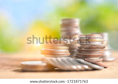 Business Concept, Finance investment saving up money for great financial purpose growing in market and business capital, gross profit with coin stacked in pile with copyspace