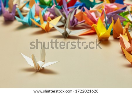 Group of colorful origami Crane background, shallow depth of field